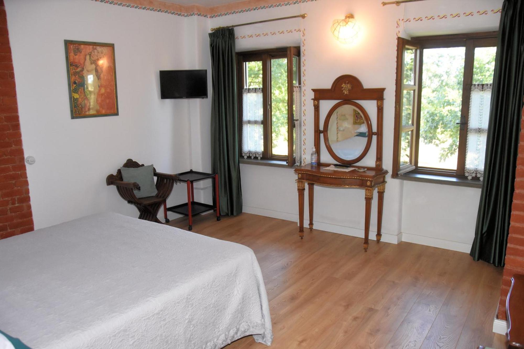 Guest House La Carolina Tigliole Buitenkant foto